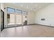 Bright living room featuring tile floors and large windows at 11850 E Del Timbre Dr, Scottsdale, AZ 85259