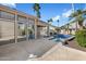 View of the backyard pool and patio from inside the house at 11850 E Del Timbre Dr, Scottsdale, AZ 85259