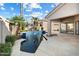 Relaxing pool area with flagstone patio and lush landscaping at 11850 E Del Timbre Dr, Scottsdale, AZ 85259