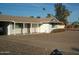 Charming single-story home featuring a covered entry, low maintenance landscaping, and a spacious driveway at 12001 N Pebble Beach Dr, Sun City, AZ 85351