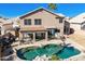 Aerial view of a house with a large pool and backyard at 1231 N Layman St, Gilbert, AZ 85233