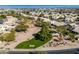 Aerial view of community with homes, green spaces, and a park at 1231 N Layman St, Gilbert, AZ 85233