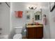 Clean bathroom with granite countertop and updated vanity at 1231 N Layman St, Gilbert, AZ 85233