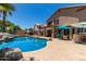 Inviting kidney-shaped pool with a large backyard at 1231 N Layman St, Gilbert, AZ 85233