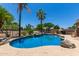 Beautiful kidney shaped pool with a waterfall feature at 1231 N Layman St, Gilbert, AZ 85233