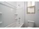 Bathroom with a shower and toilet near a window at 12722 W Luxton Ln, Avondale, AZ 85323