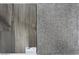 Wood-look tile and gray carpet samples at 12722 W Luxton Ln, Avondale, AZ 85323