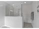 Walk-in shower with subway tile and a built-in seat at 13331 E Parkview Ln, Scottsdale, AZ 85255