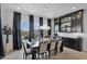 Elegant dining room with large windows and pool view at 13331 E Parkview Ln, Scottsdale, AZ 85255