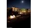 Night view of home's front yard with desert landscaping at 13331 E Parkview Ln, Scottsdale, AZ 85255