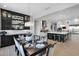 Open concept kitchen and dining area with modern cabinetry and island at 13331 E Parkview Ln, Scottsdale, AZ 85255