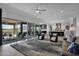 Living area with sliding doors opening to the patio at 13331 E Parkview Ln, Scottsdale, AZ 85255