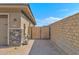 Side gate entrance with brick wall at 13331 E Parkview Ln, Scottsdale, AZ 85255