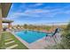 Inviting swimming pool with surrounding patio and lounge chairs at 13331 E Parkview Ln, Scottsdale, AZ 85255