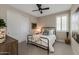 Bright bedroom with a queen bed, window shutters, and closet at 1336 E Sierra Vista Dr, Phoenix, AZ 85014