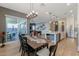 Kitchen and dining area with wood table and access to backyard at 1336 E Sierra Vista Dr, Phoenix, AZ 85014