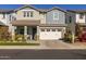 Two-story home with white garage door and landscaping at 1336 E Sierra Vista Dr, Phoenix, AZ 85014