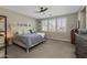 Main bedroom with neutral decor and ceiling fan at 1336 E Sierra Vista Dr, Phoenix, AZ 85014