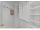 Large walk-in closet with ample shelving and hanging space at 16206 S 11Th Pl, Phoenix, AZ 85048