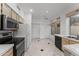 Kitchen with stainless steel appliances and wood cabinets at 16206 S 11Th Pl, Phoenix, AZ 85048