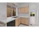 Kitchen with wood cabinets and tile countertops at 16206 S 11Th Pl, Phoenix, AZ 85048