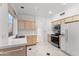 Bright kitchen with light wood cabinets and appliances at 16206 S 11Th Pl, Phoenix, AZ 85048