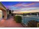 Brick patio offers scenic lake and sunset views at 16206 S 11Th Pl, Phoenix, AZ 85048