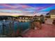 Brick patio overlooks lake with sunset views at 16206 S 11Th Pl, Phoenix, AZ 85048