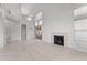 High-ceiling living room with fireplace and tile floors at 16206 S 11Th Pl, Phoenix, AZ 85048