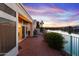 Evening view of the patio and lake, sunset colors at 16206 S 11Th Pl, Phoenix, AZ 85048