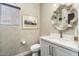 Stylish bathroom with updated vanity and decorative mirror at 16310 W Boulder Dr, Surprise, AZ 85374