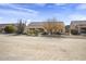 House exterior view, showcasing desert landscaping at 16310 W Boulder Dr, Surprise, AZ 85374