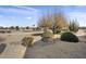 Landscaped front yard with desert landscaping and gravel at 16310 W Boulder Dr, Surprise, AZ 85374