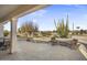 Spacious patio with seating area overlooking the golf course at 16310 W Boulder Dr, Surprise, AZ 85374