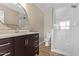 Updated bathroom with a large walk-in shower and modern vanity at 1682 W Campbell Ave, Phoenix, AZ 85015