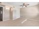 Well-lit bedroom with ceiling fan and neutral decor at 1682 W Campbell Ave, Phoenix, AZ 85015