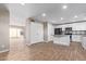 Modern kitchen with white cabinets, gray countertops, and an island at 1682 W Campbell Ave, Phoenix, AZ 85015