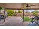 Covered patio, artificial turf, and play area at 17009 S 30Th Way, Phoenix, AZ 85048