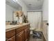 Bathroom boasts wood vanity, shower, and tile flooring at 17009 S 30Th Way, Phoenix, AZ 85048