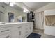 Double vanity, modern lighting, and updated fixtures at 17009 S 30Th Way, Phoenix, AZ 85048