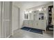 Bathroom boasts double vanity and stylish flooring at 17009 S 30Th Way, Phoenix, AZ 85048