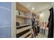 Built-in shelving and drawers in this large closet at 17009 S 30Th Way, Phoenix, AZ 85048