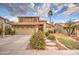 Two-story house with a landscaped yard and attached garage at 17009 S 30Th Way, Phoenix, AZ 85048