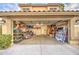 Two-car garage with shelving and ample storage at 17009 S 30Th Way, Phoenix, AZ 85048