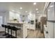 Modern kitchen with white cabinets, quartz countertops, and stainless steel appliances at 17009 S 30Th Way, Phoenix, AZ 85048