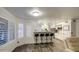 Modern kitchen with white cabinets, a breakfast bar, and stainless steel appliances at 17009 S 30Th Way, Phoenix, AZ 85048