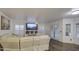 Living room boasting a comfy sectional sofa and built-in entertainment center at 17009 S 30Th Way, Phoenix, AZ 85048