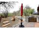 Landscaped backyard with fire pit and patio at 17020 E Kiwanis Dr # 102, Fountain Hills, AZ 85268