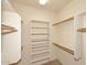 Large walk-in closet with shelves and hanging rods at 17020 E Kiwanis Dr # 102, Fountain Hills, AZ 85268