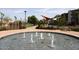 Circular fountain with multiple water jets in a community area at 17020 E Kiwanis Dr # 102, Fountain Hills, AZ 85268